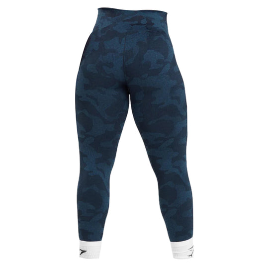 Gymshark high-waisted navy blue camo leggings with a ribbed texture, featuring a branded white cuff at the ankle.