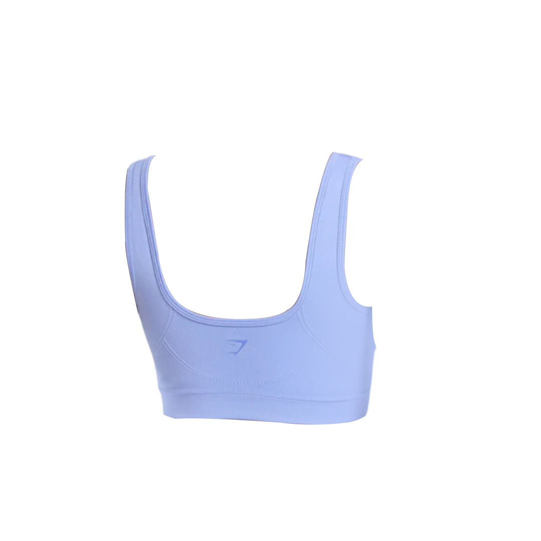 Light purple sports bra with a scoop back design and a subtle logo on the front, designed for comfort and support.