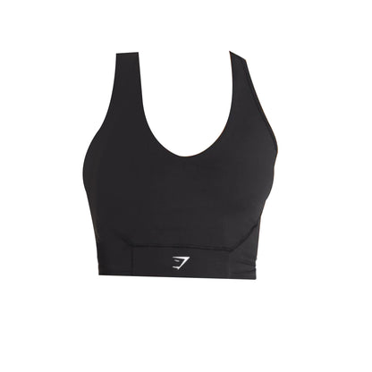 Black crop mesh tank bra with white logo on waistband.
