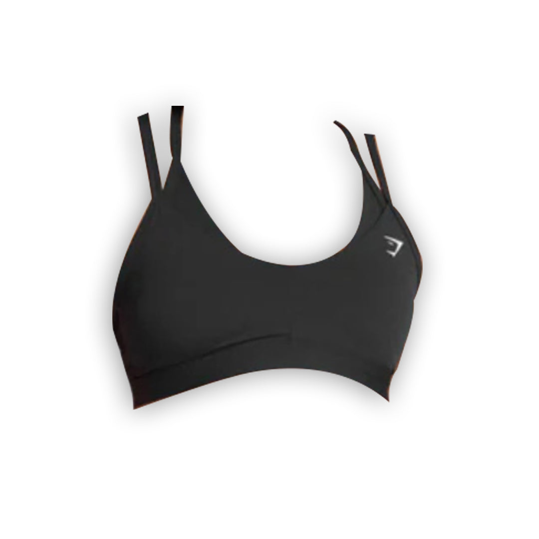Gymshark double up sports bra with thin straps and a logo, designed for fitness and active wear.