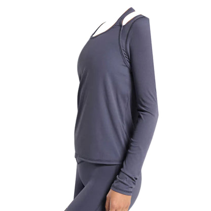 A dark gray Elevate long-sleeve athletic top with unique strap detailing, paired with matching leggings.