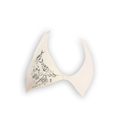 Cream triangle bikini top featuring marine-themed black illustrations including fish, seaweed, and the phrase "soft life."