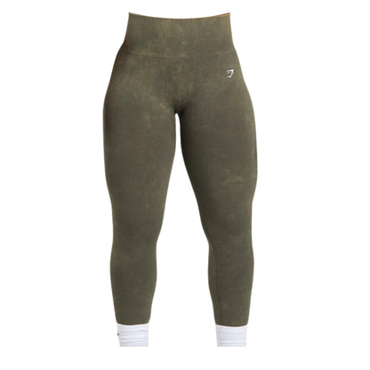Olive green Gymshark Seamless Leggings featuring a high ribbed waistband, white logo on the upper left leg, and white ribbed ankle cuffs.