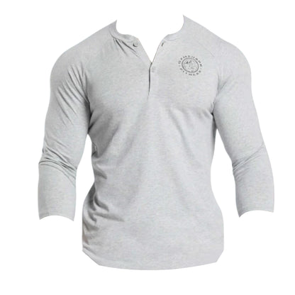 Light gray long-sleeve Gymshark Legacy T-shirt with a Henley neck and a small logo on the chest.