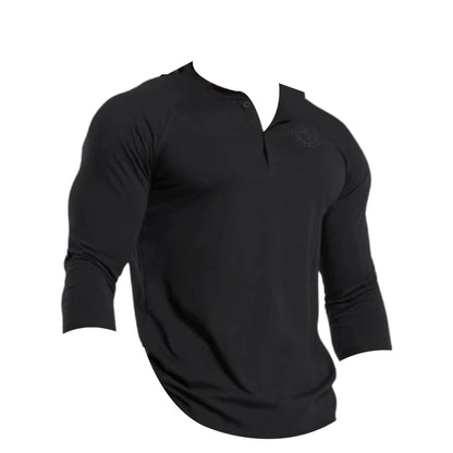 Black long-sleeve henley shirt with a relaxed fit and three-button placket, shown without a model.