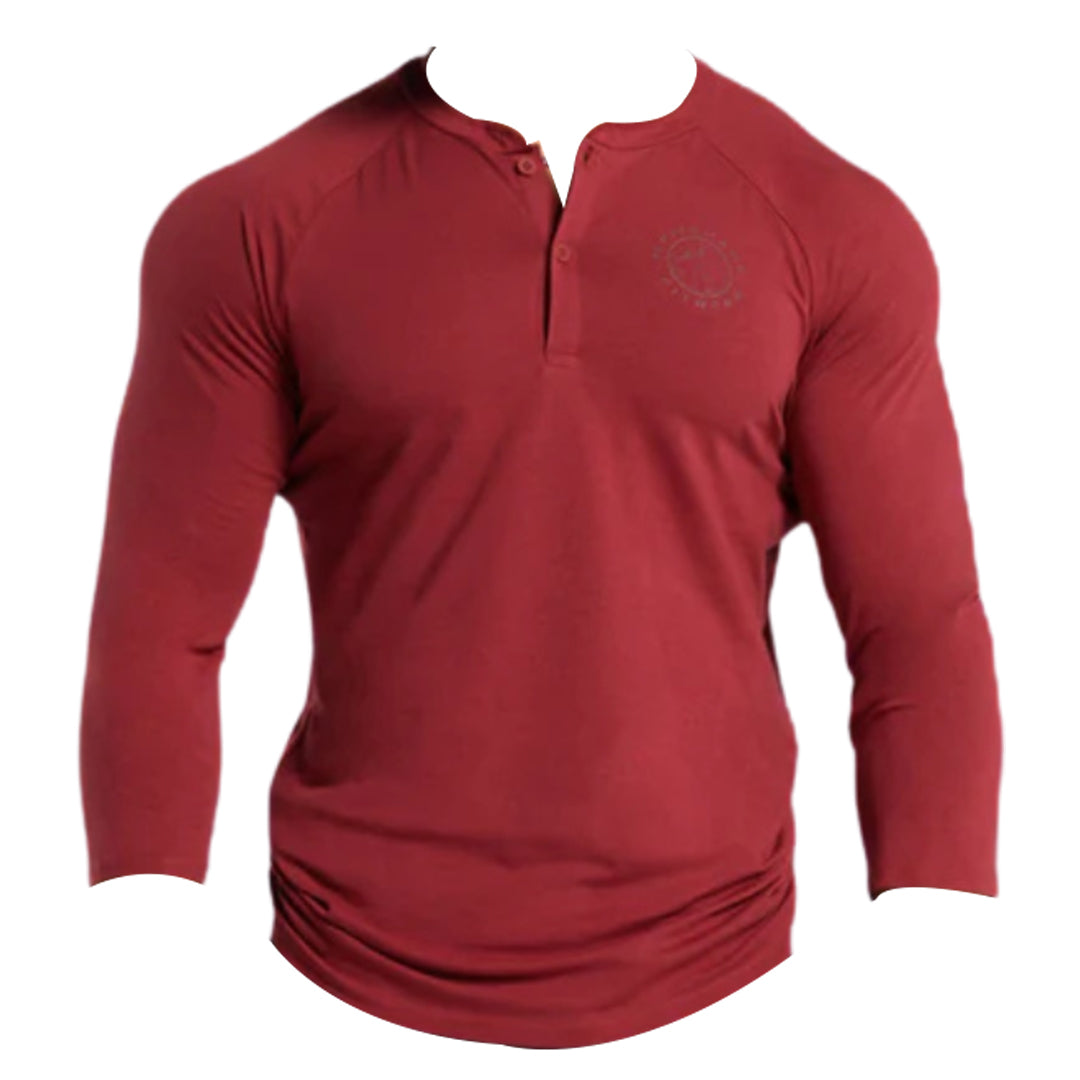 Maroon long-sleeve henley shirt with a round neckline and partial button front, featuring a logo on the left side.