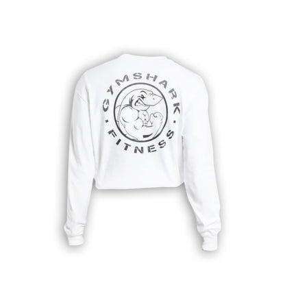 White cropped long-sleeve shirt featuring a black Gymshark logo with a muscular shark graphic on the back.