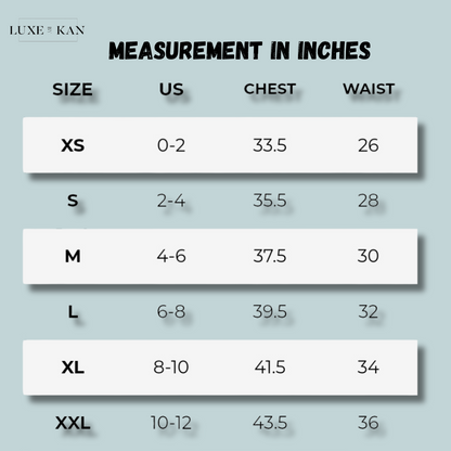 Gymshark sizing chart displaying measurements in inches for women's clothing: XS to XXL, including chest and waist sizes.