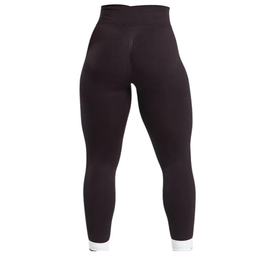 Black high-waisted leggings with a smooth finish and a snug fit, showcasing their sleek design from the back view.