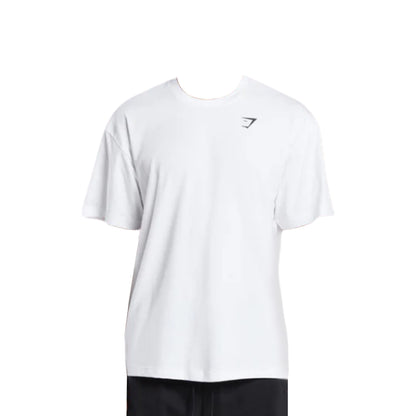 Gymshark white short-sleeve Essential Oversized T-Shirt featuring a small chest logo, displayed without a model.