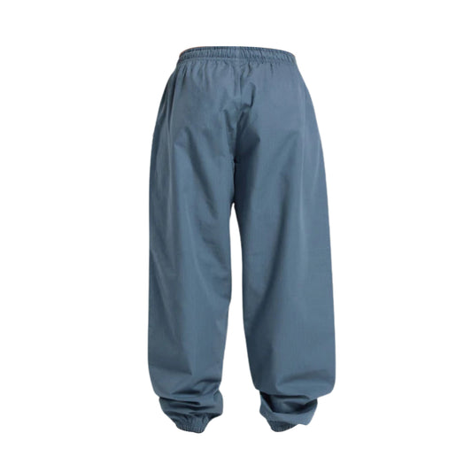 Light blue, elastic-waist lounge pants with a loose fit and elastic cuffs at the ankles, displayed from the back.