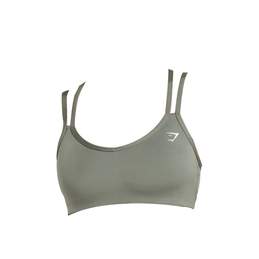 Olive green sports bra with adjustable thin straps and a logo on the side, designed for comfort and support in workouts.