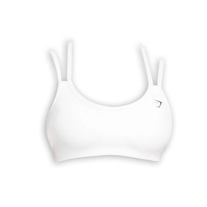 A simple white sports bra with thin straps and a rounded neckline, featuring a small logo on the side.
