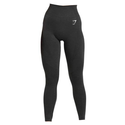 Black high-waisted leggings featuring textured patterns and a logo on the waistband, designed for comfort and style during workouts.