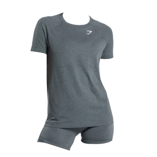 A gray athletic outfit featuring a fitted Vital Seamless 2.0 Light T-Shirt and matching shorts, designed for comfort during workouts.