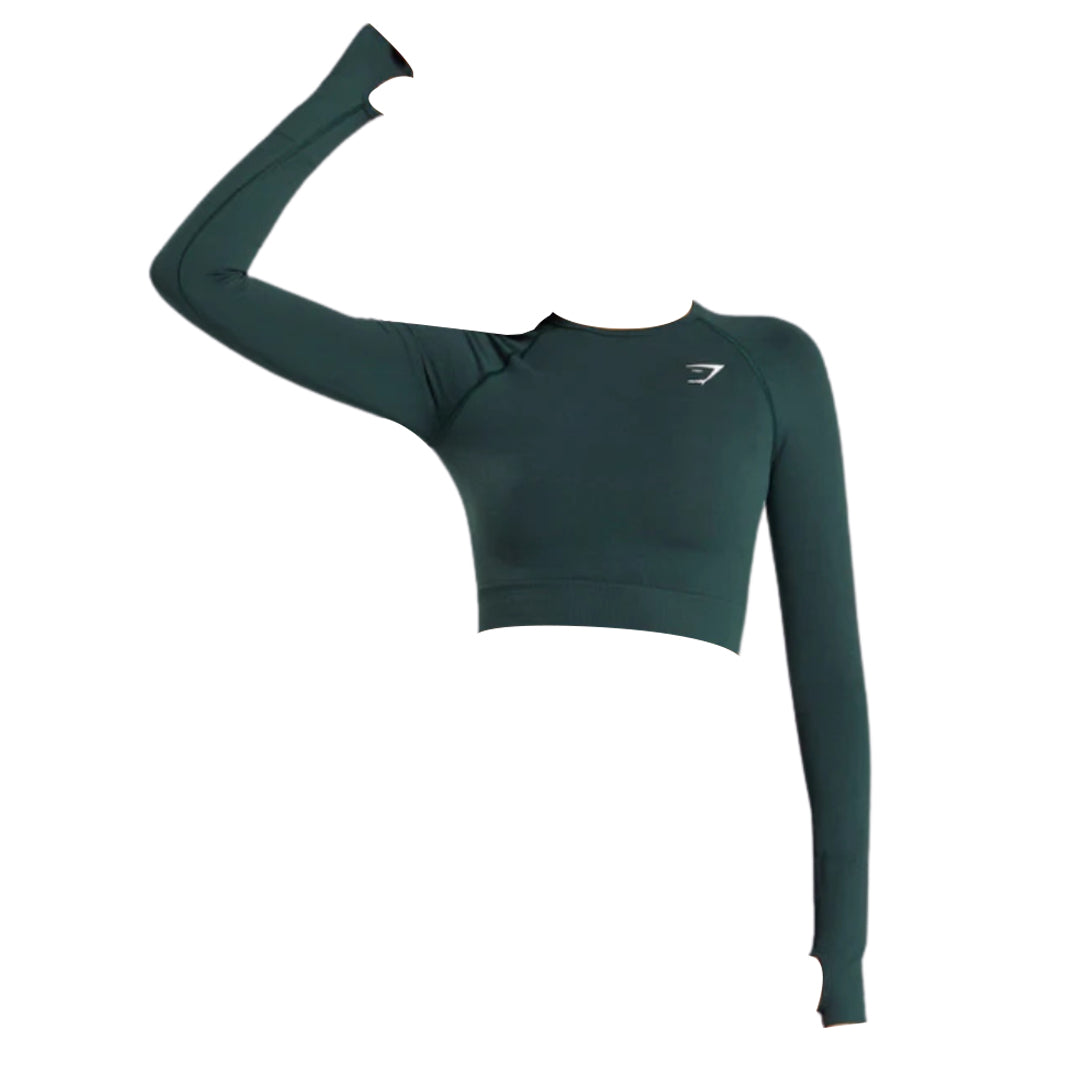 Dark green athletic crop top with long sleeves, featuring a logo on the chest and an arm raised in a dynamic pose.