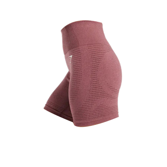 Side view of Gymshark Vital Seamless 2.0 Shorts in mauve, featuring a high waistband, a small white logo on the upper left leg, and a textured, hole-punched pattern throughout.
