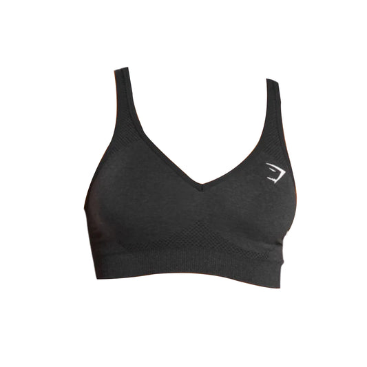 Gymshark Vital Seamless V Neck Sports Bra, featuring a V-neckline, and thin straps. The bra has the Gymshark logo, a stylized sideways shark fin, in bright white on the left side.