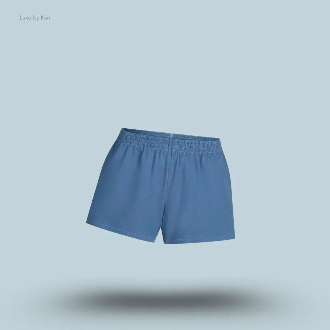 SKIMS Cotton Jersey Loose Short in Harbor, flat lay on light blue background