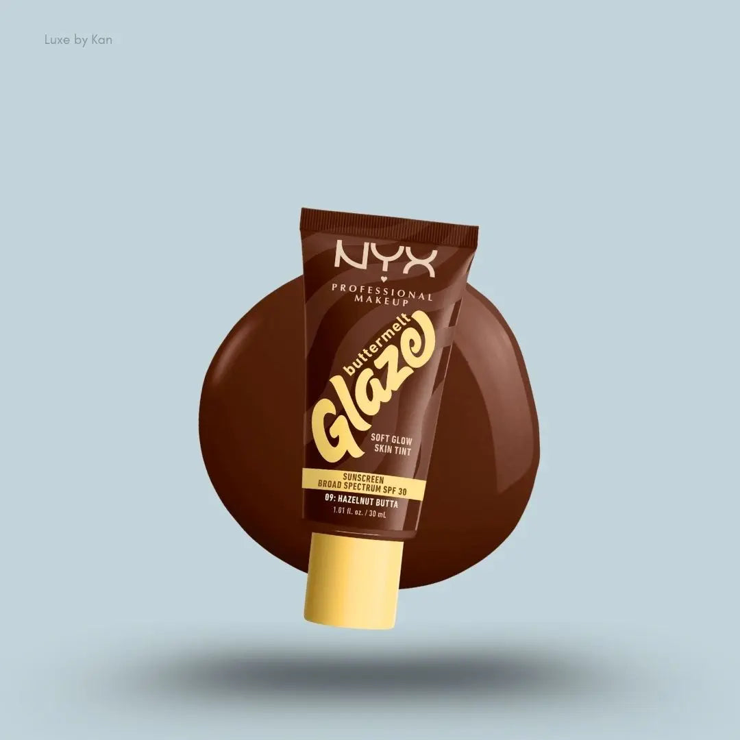 NYX Professional Makeup Buttermelt Glaze Skin Tint SPF 30 tube and swatch on blue background — LBK
