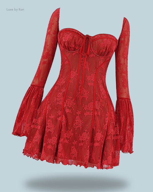 A stunning House of CB red Analissa lace corset dress featuring a structured bodice, flowing sleeves, and a flirty skirt, perfect for a chic evening look.