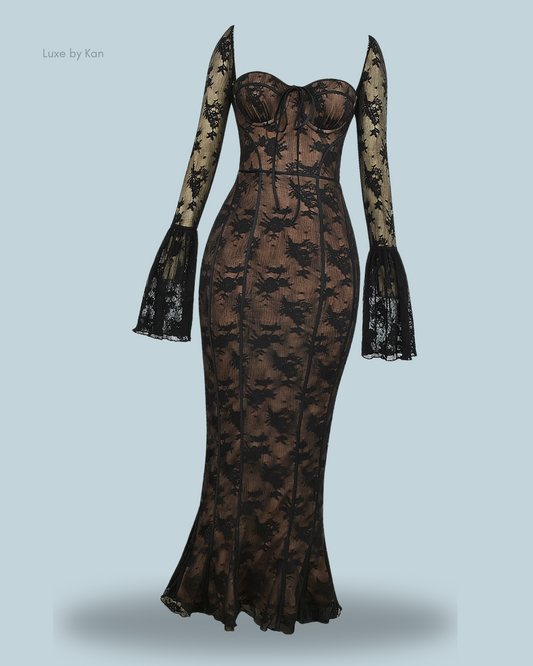 A long, form-fitting black House of CB Delilah long sleeve lace maxi dress with sheer flared sleeves and a sweetheart neckline, displayed on a plain light background.