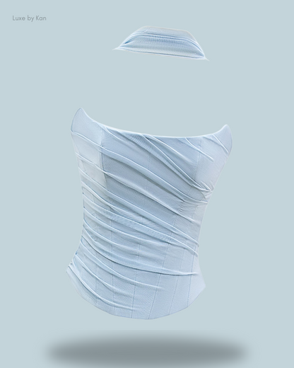 A stylish Light blue House of CB Hallie strapless corset top, featuring a structured fit and a detachable neck scarf for added flair.