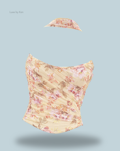 A stylish Floral House of CB Hallie strapless corset top, featuring a structured fit and a detachable neck scarf.