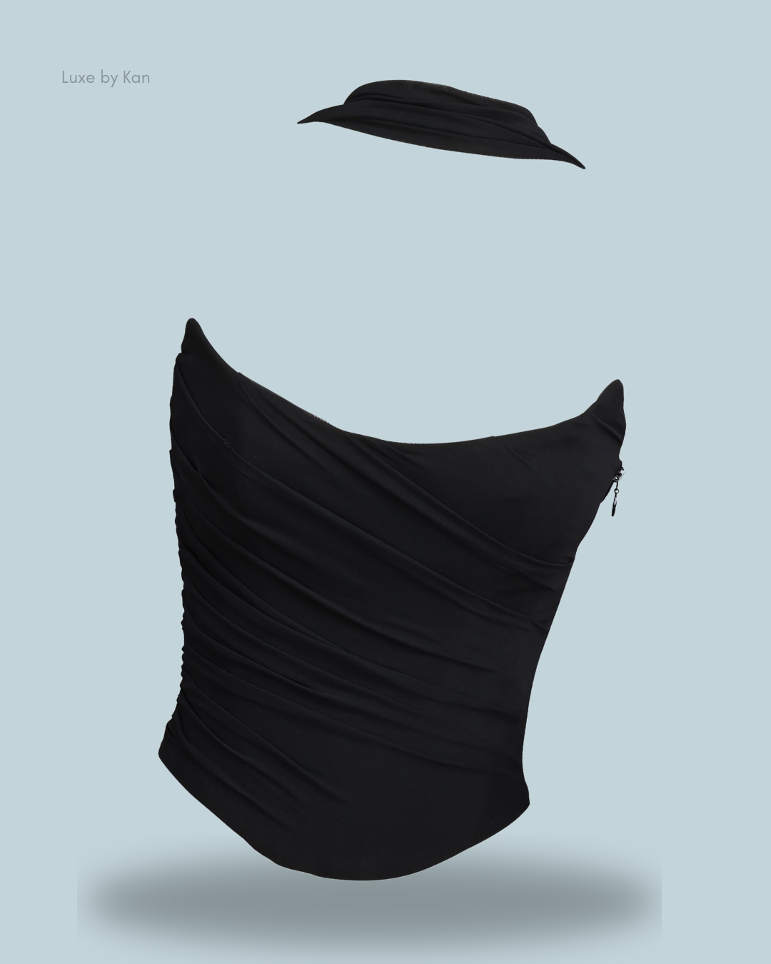 A stylish Black House of CB Hallie strapless corset top, featuring a structured fit and a detachable neck scarf.