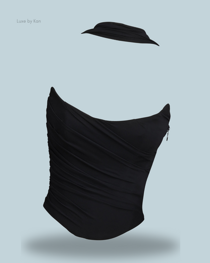 A stylish Black House of CB Hallie strapless corset top, featuring a structured fit and a detachable neck scarf.