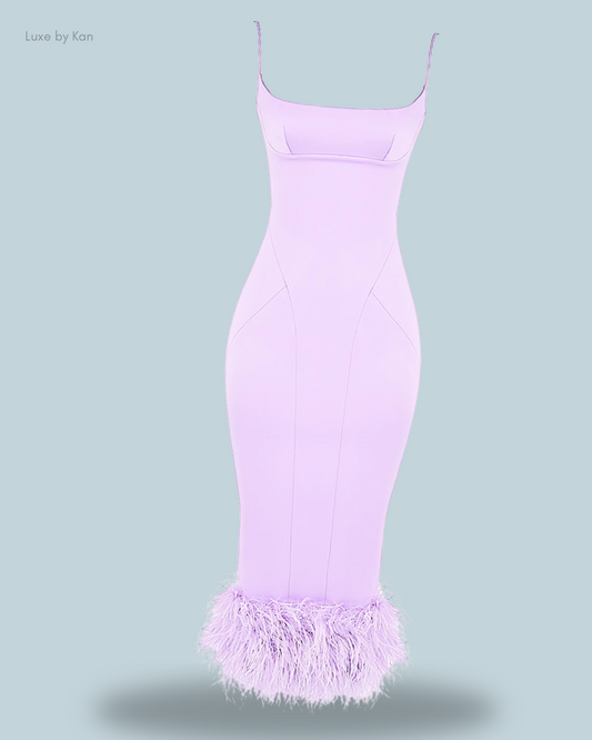 A form-fitting lavender House of CB Helena Orchid satin midi dress featuring delicate spaghetti straps and a playful fluffy feathered hem for a touch of glamour.