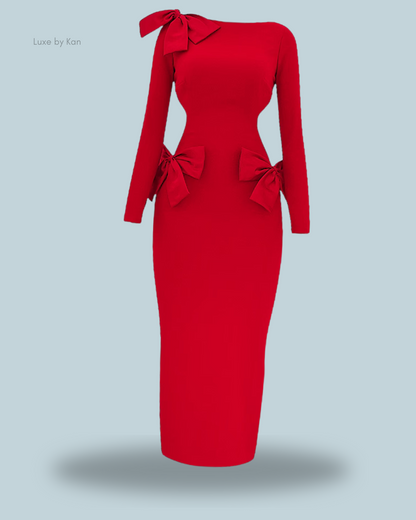 Long-sleeved lavele red bow maxi dress with a fitted silhouette and decorative bows on one shoulder and hips.
