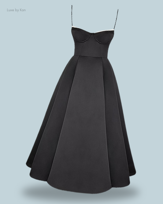 Front view of the Black House of CB Mademoiselle tulle midi dress with corset bodice, thin straps, and flared paneled skirt.