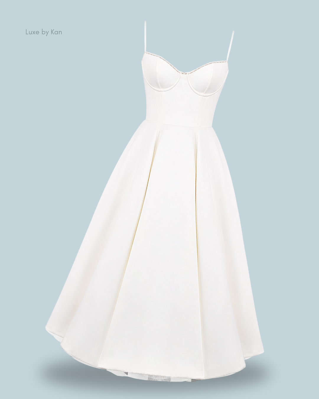 White mademoiselle tulle midi dress with a fitted bodice, delicate straps, and a flared skirt.