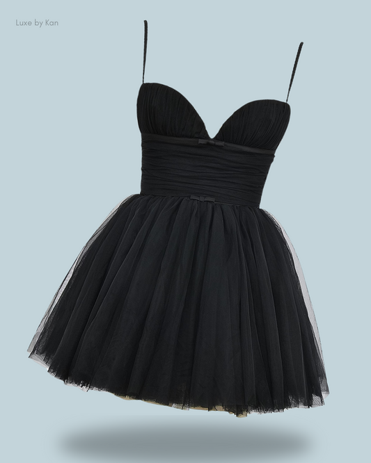 A stylish black House of CB Princess tulle mini dress featuring a sweetheart neckline, delicate thin straps, and a voluminous layered tulle skirt.