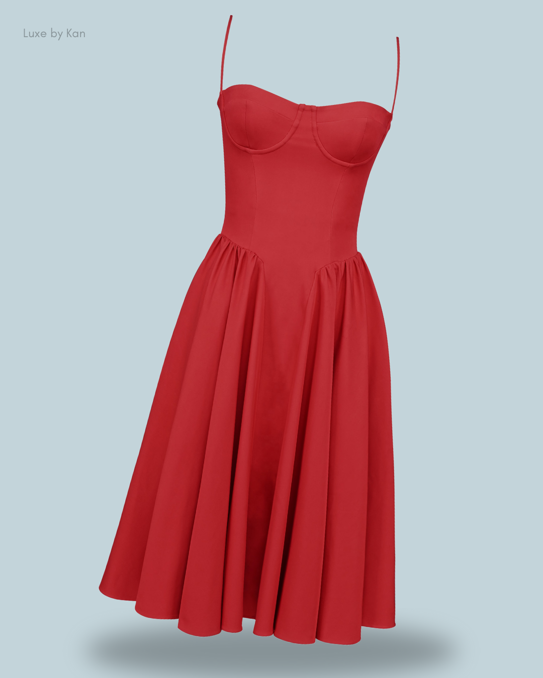 A vibrant red samaria gathered midi dress with a fitted bodice and flowing skirt.