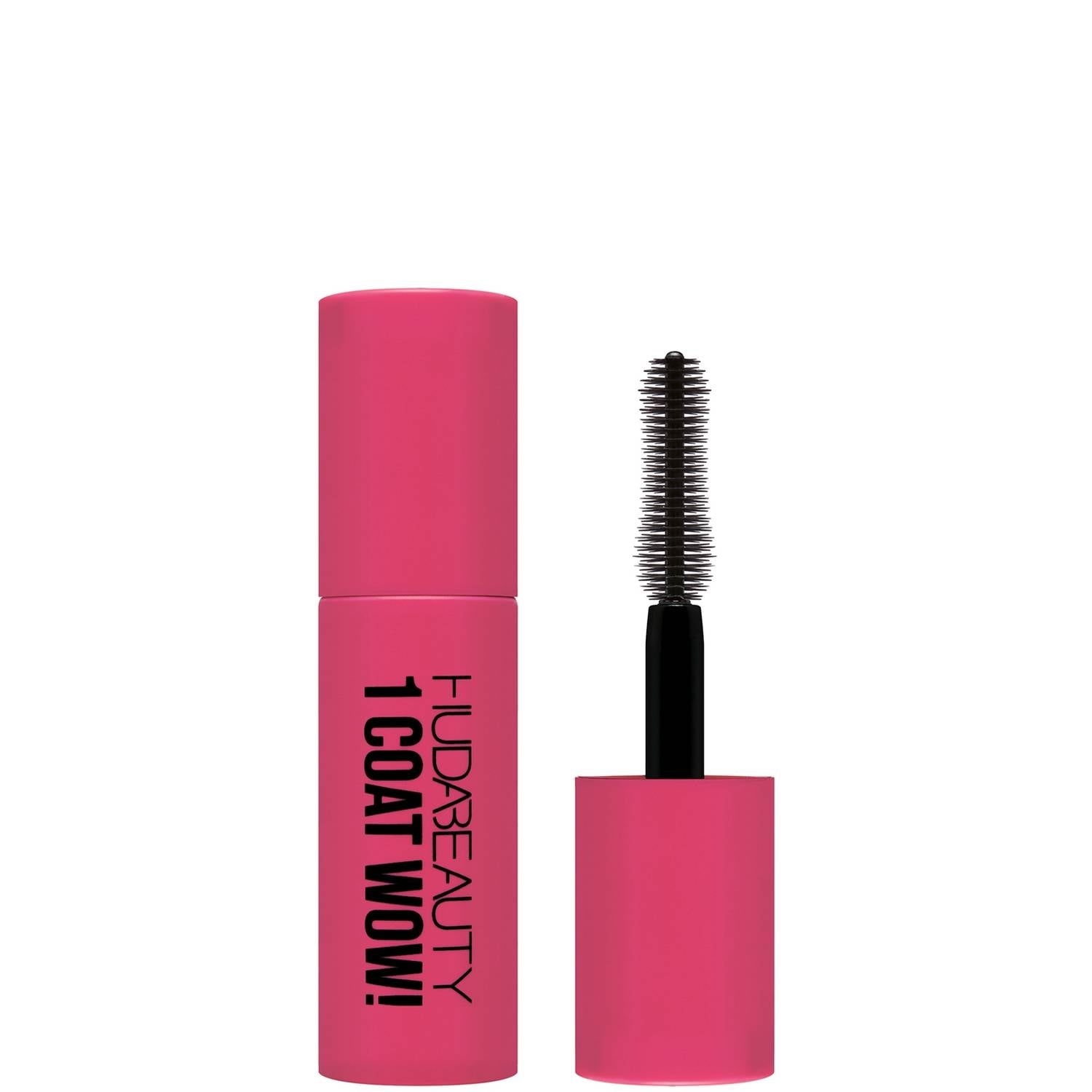 A bright pink mascara tube labeled "Huda beauty 1 Coat Wow!" with a black brush partially visible, emphasizing bold, voluminous lashes.