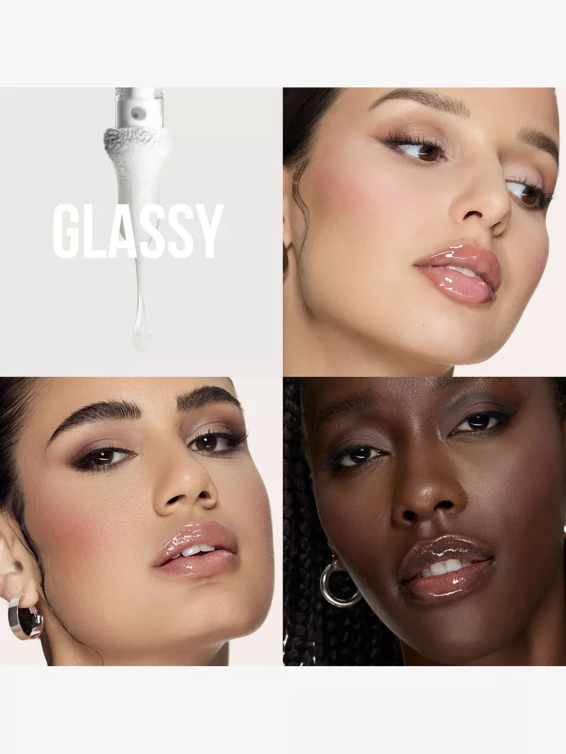 Two women showcasing shiny hairstyles, with the word "GLASSY" prominently displayed above a glossy product.