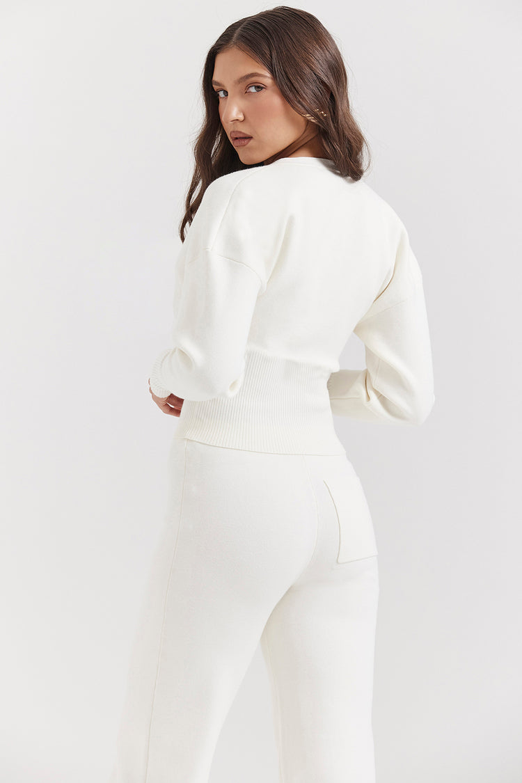 House of CB NOOR
OFF WHITE KNITTED CARDIGAN