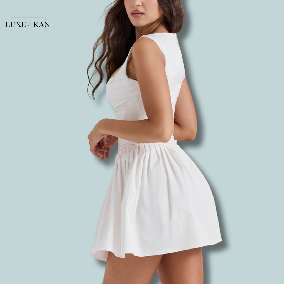 House of CB CUPID 
WHITE PLEATED MINI DRESS