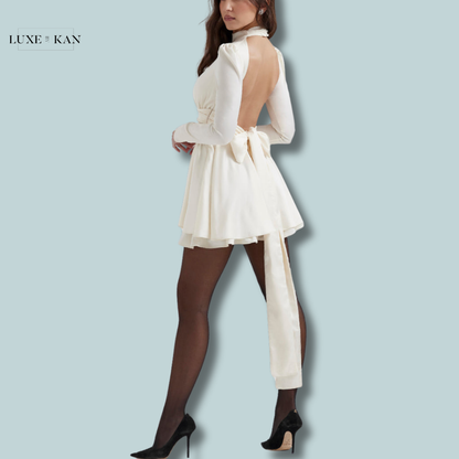 House of CB ARYANA 
IVORY BOW MINI DRESS