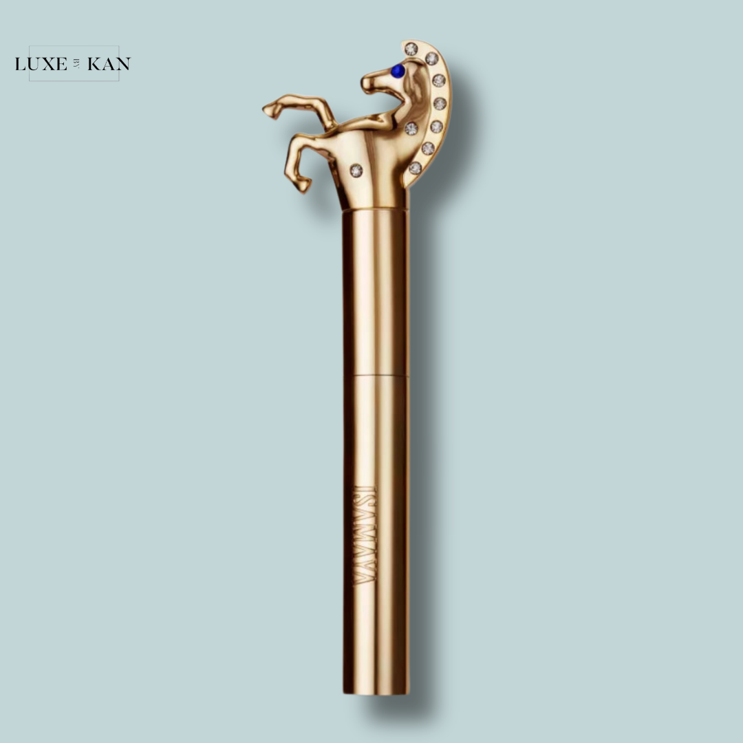 Isamaya beauty lash lasso lash wrap mascara tube topped with a horse figurine adorned with blue gem and rhinestones.