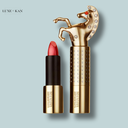 A luxurious luckykiss diamond lip glow lipstick with a horse-shaped cap and sparkling accents, featuring a vibrant red lipstick bullet beside it.