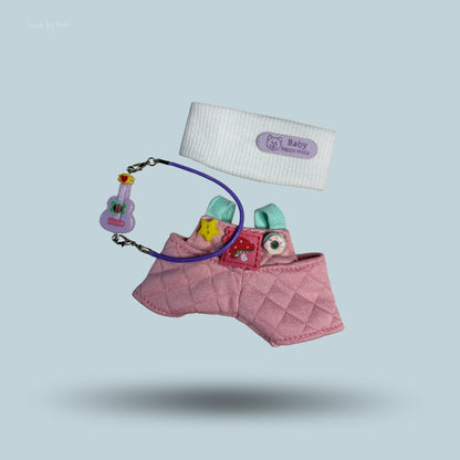 Labubu doll accessories set including pink quilted overalls, a white headband, and miniature guitar.