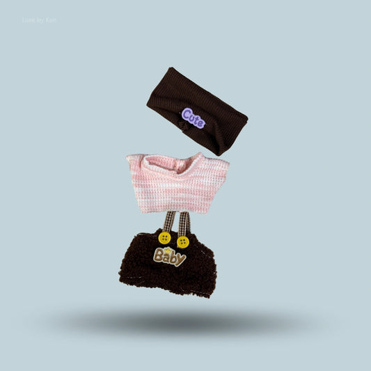 Three-piece Labubu outfit consisting of a brown headband with Cute written on it, a pink striped shirt, and brown overalls spelling Baby.