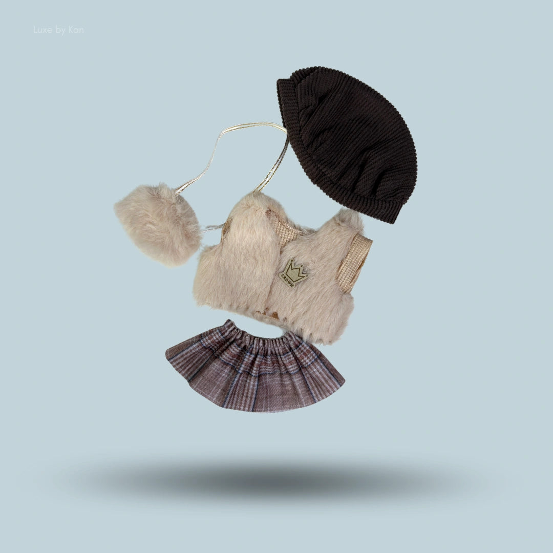 Labubu doll autumn royale outfit set consisting of a fuzzy hat, vest, bag, and skirt.