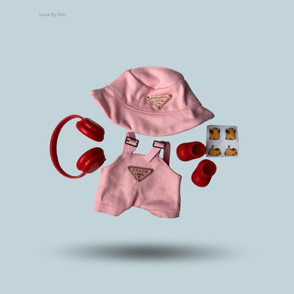 The Labubu doll wears a cozy two-piece streetwear set, including a corduroy hat and a dress adorned with a diamond argyle pattern.