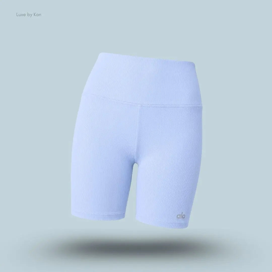 Alo 5 inch Seamless Ribbed Favorite Short in Light Provence Blue, flat lay on light blue background