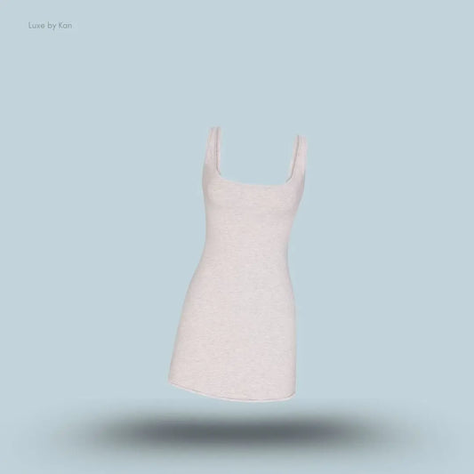 SKIMS Cotton Jersey Mini Dress in Light Heather Grey, flat lay on light blue background