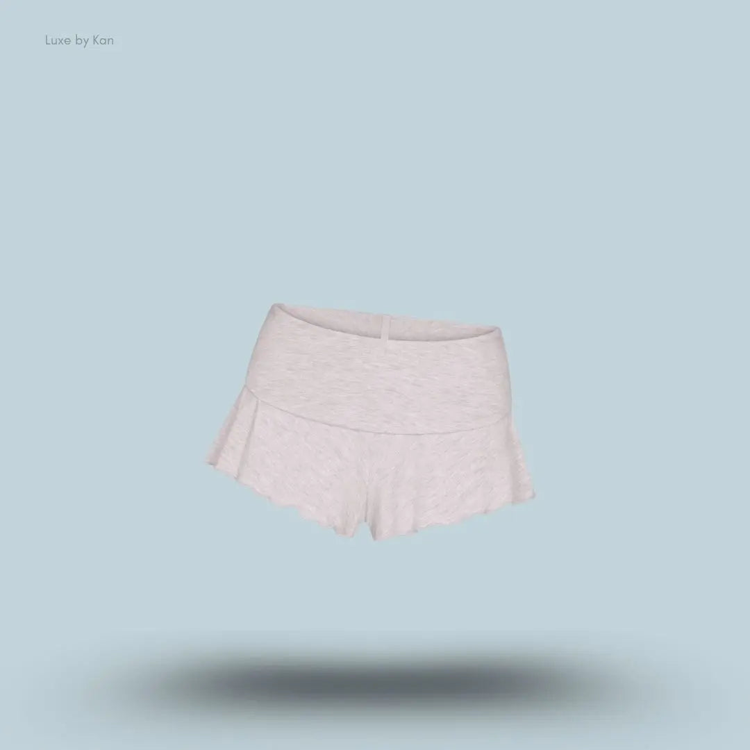 SKIMS Sleep Henley and Foldover Short Set foldover shorts in Light Heather Grey, flat lay on light blue background